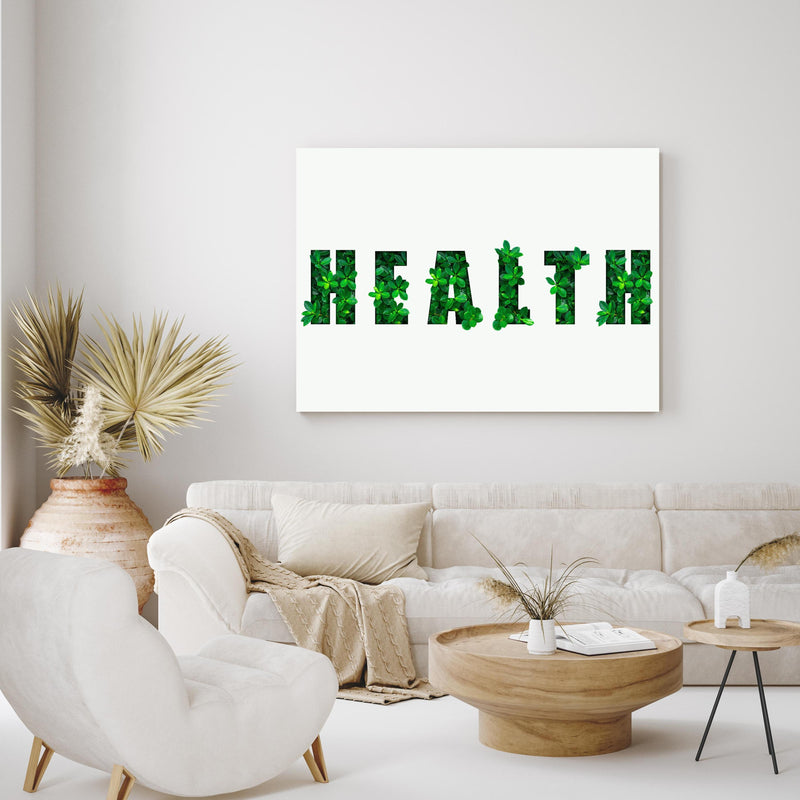 Wandbild - Wort HEALTH aus grünen Blättern in exotisch eingerichtetem Wohnzimmer über gemütlicher Couch