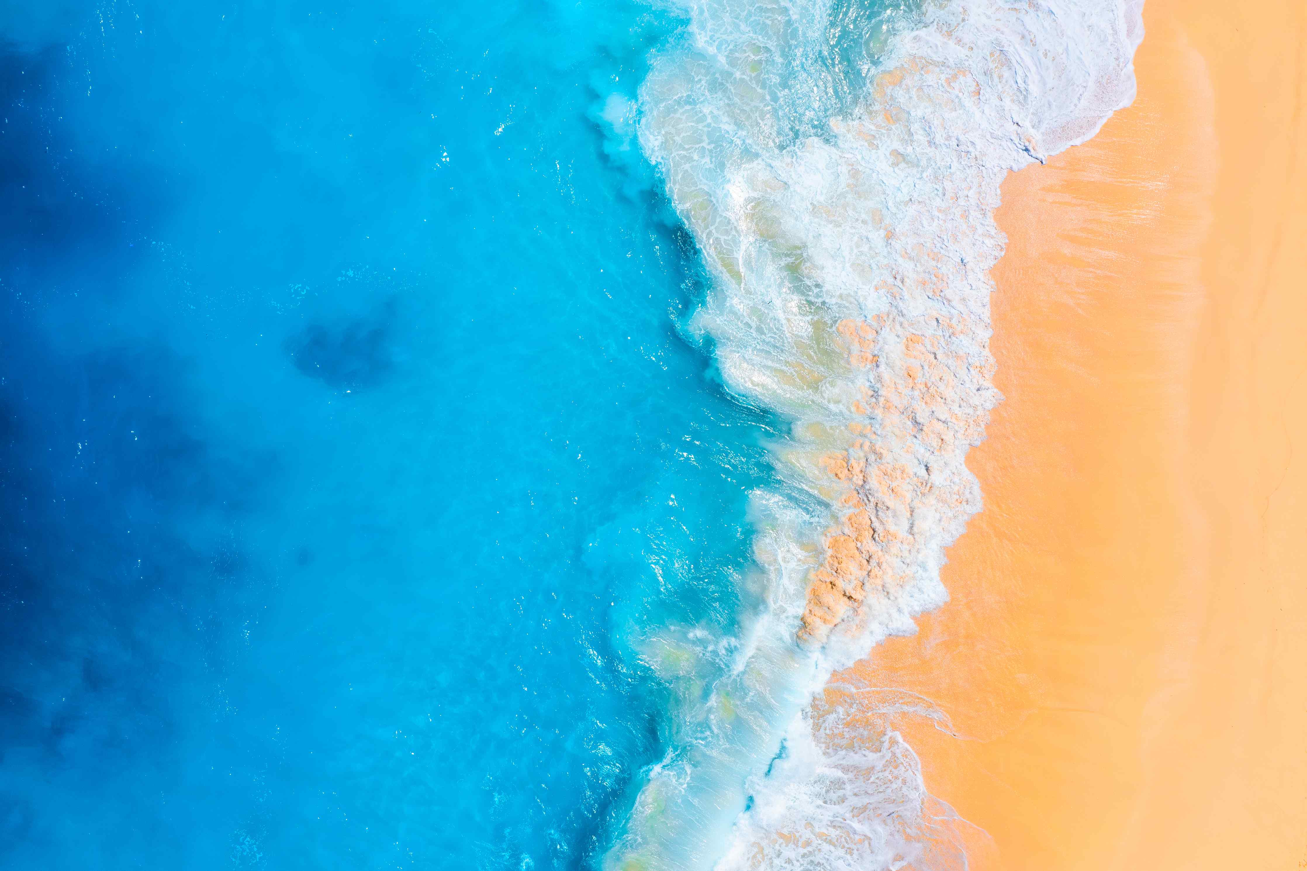 Wandverkleidung Bad-Leuchtendes Meerespanorama mit Sandstrand