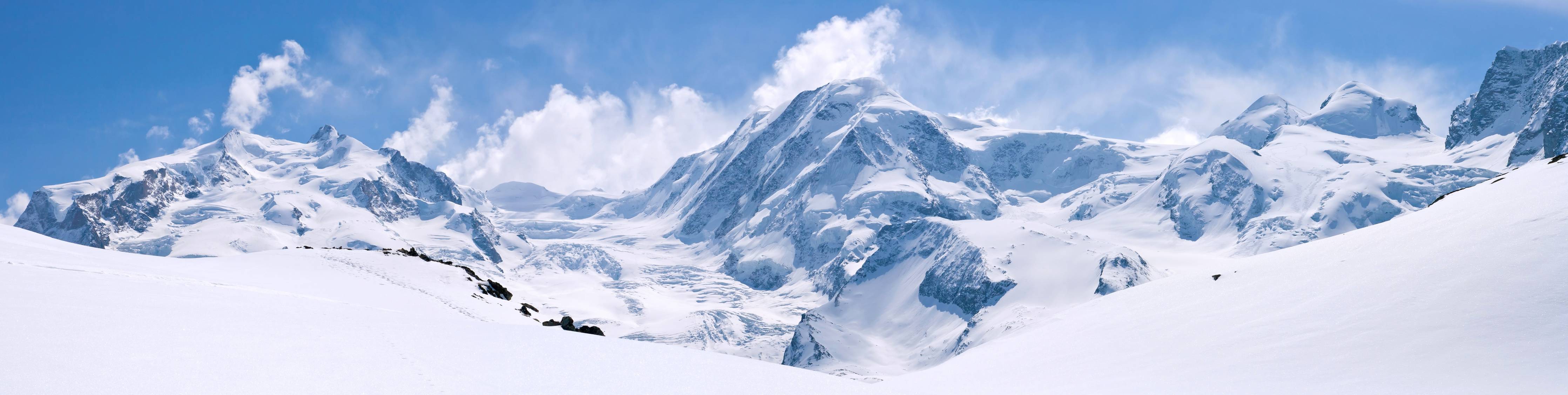 Wandverkleidung Bad-Majestätische Schneeberge im Sonnenlicht