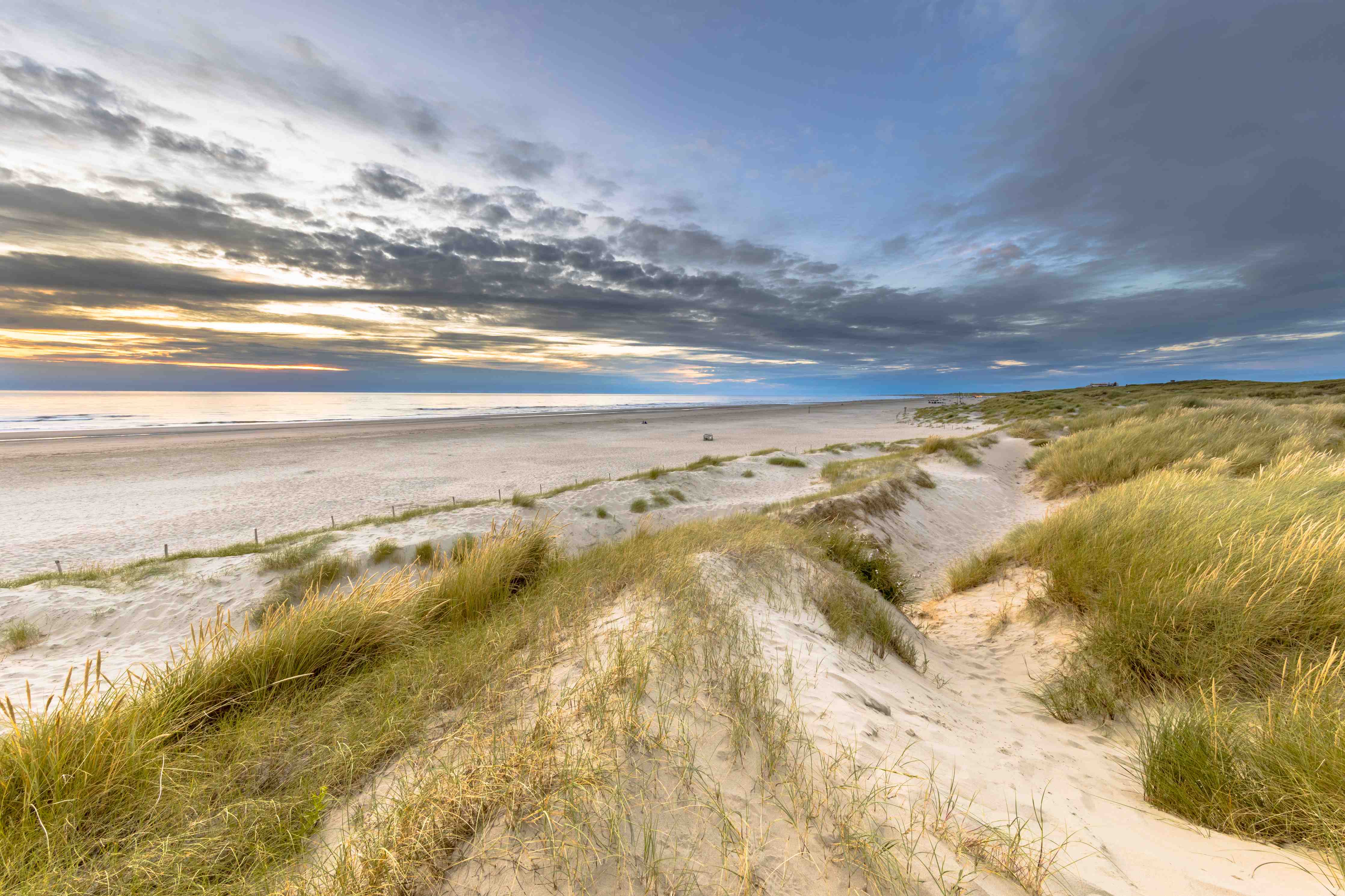 Wandverkleidung Bad-Sanddünen an der Küste bei Sonnenuntergang