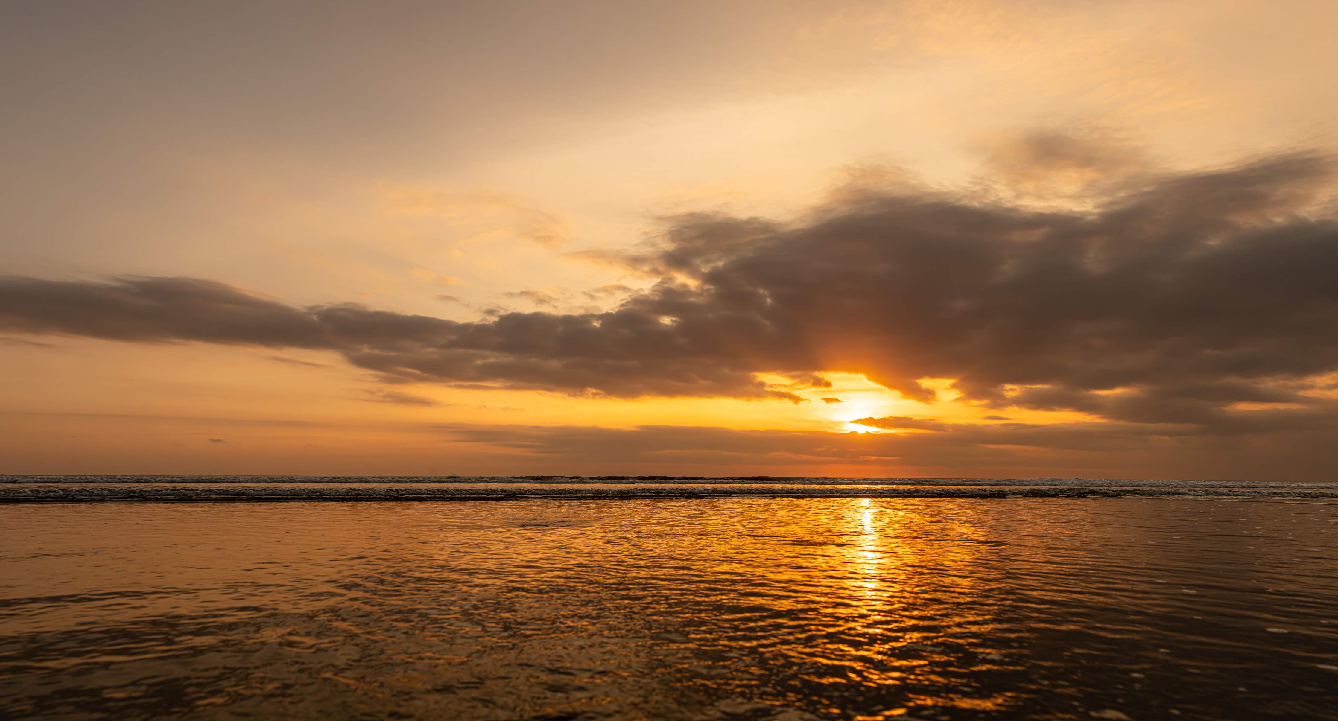 Wandverkleidung Bad-Sonnenuntergang am Meer mit warmen Farben