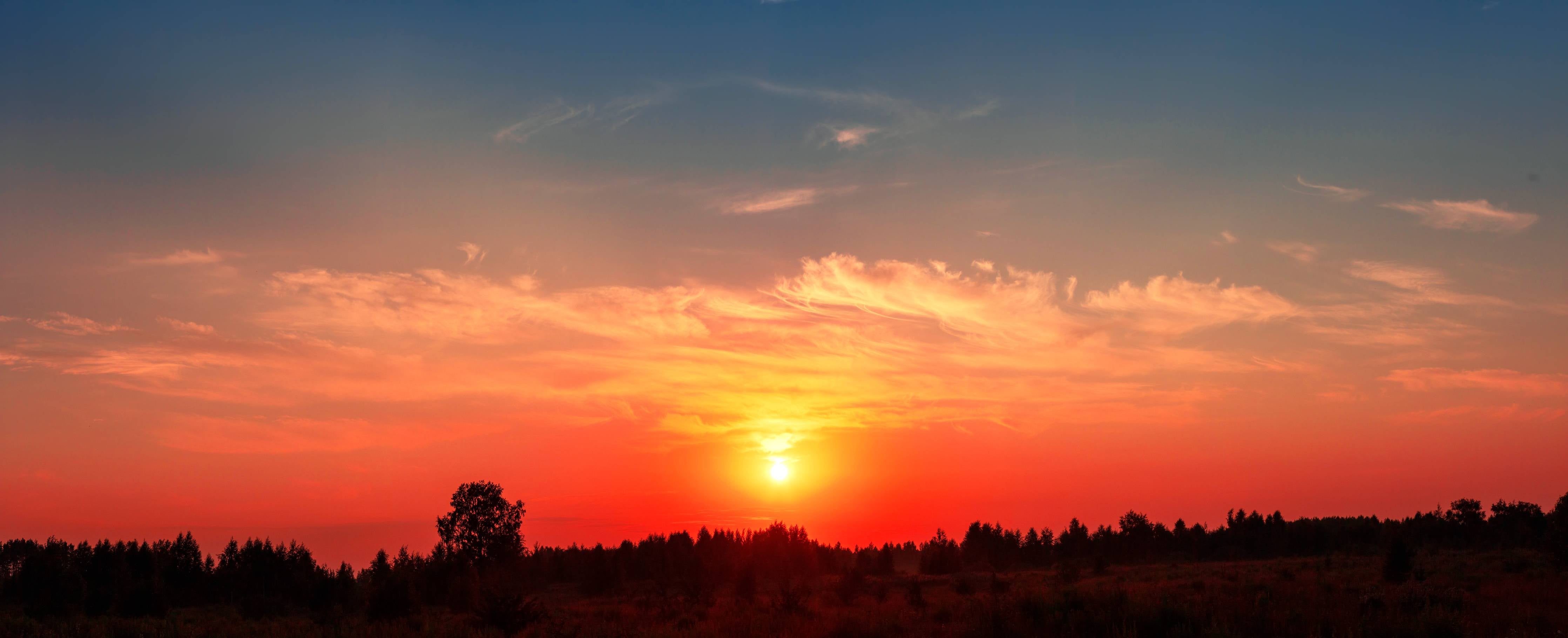 Wandverkleidung Bad-Wilder Sonnenuntergang über dem Horizont