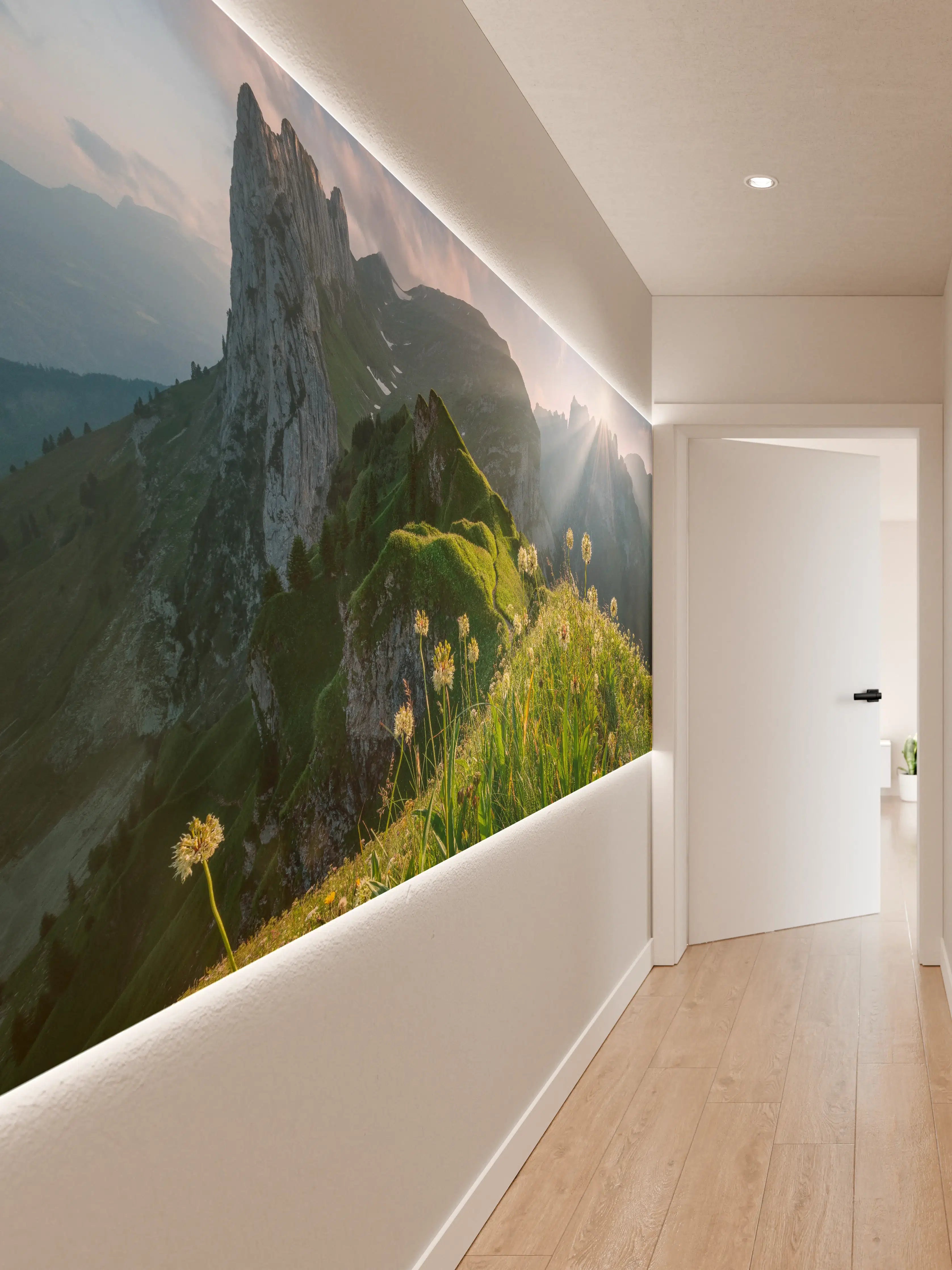 Wandverkleidung Flur - Berglandschaft bei Sonnenaufgang mit Blumen im Vordergrund