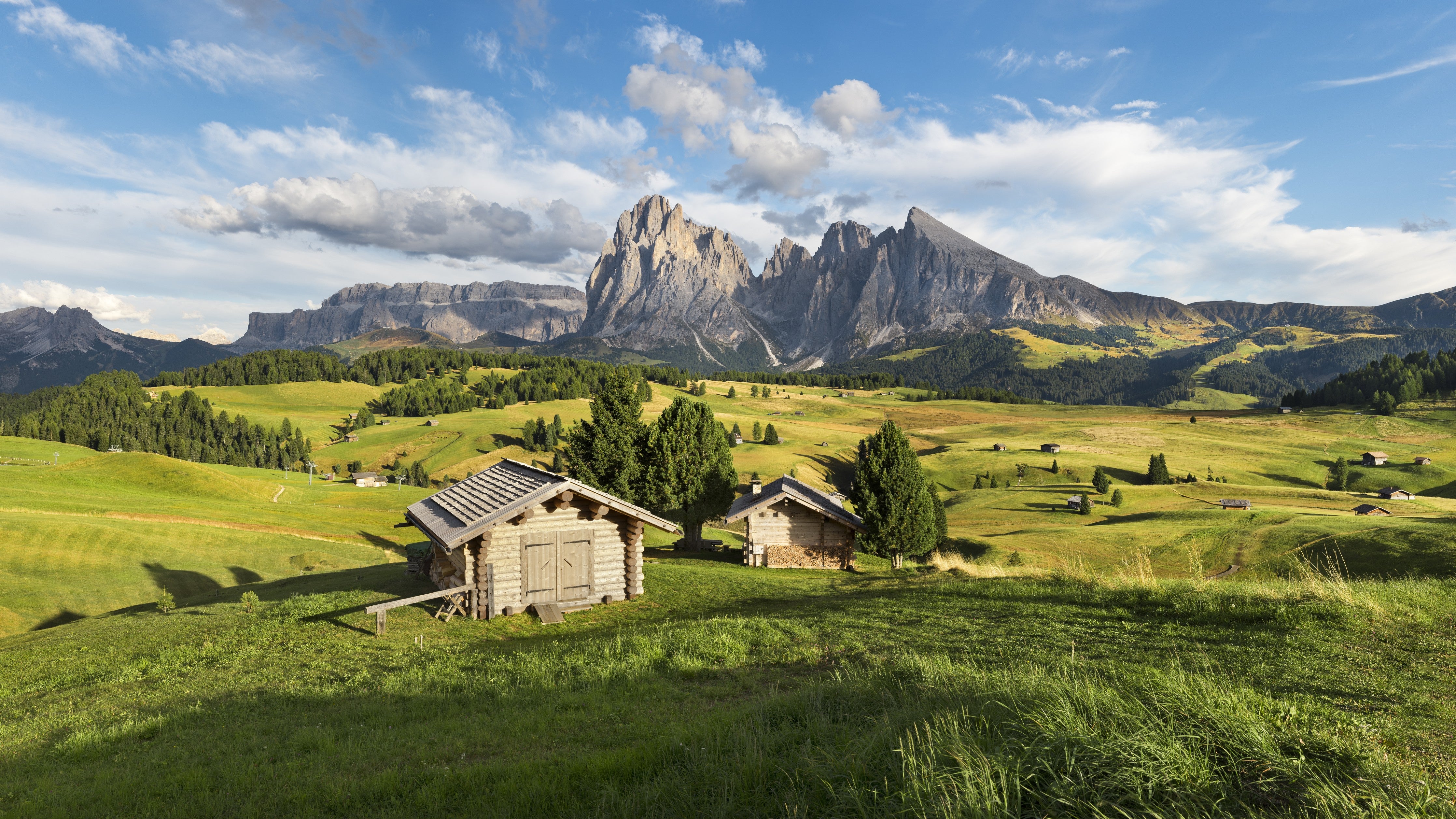 Wandverkleidung Schlafzimmer-Alpenlandschaft Panorama mit Hütten