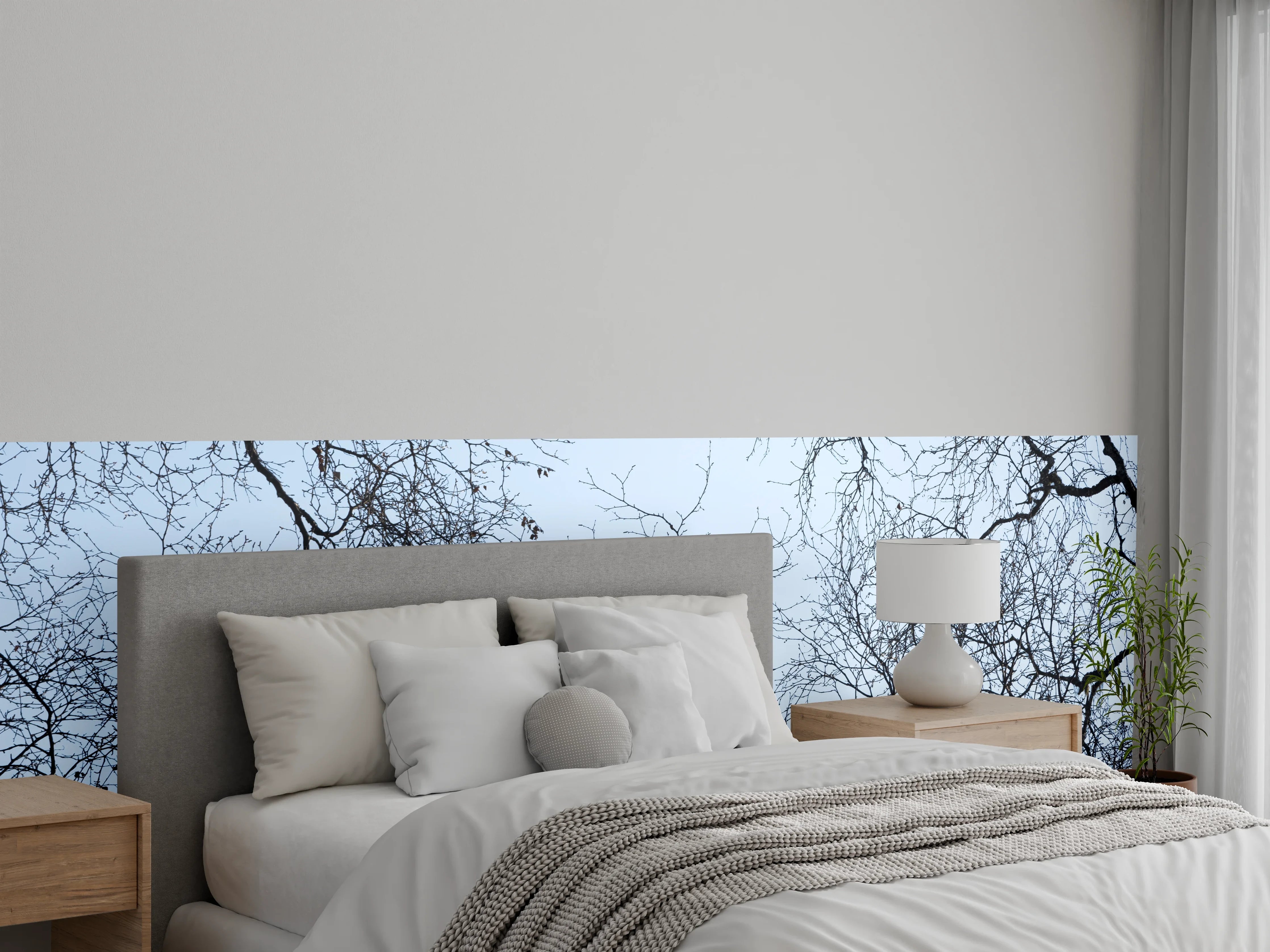 Wandverkleidung Schlafzimmer - Ästhetische Baum-Silhouetten vor blauem Himmel