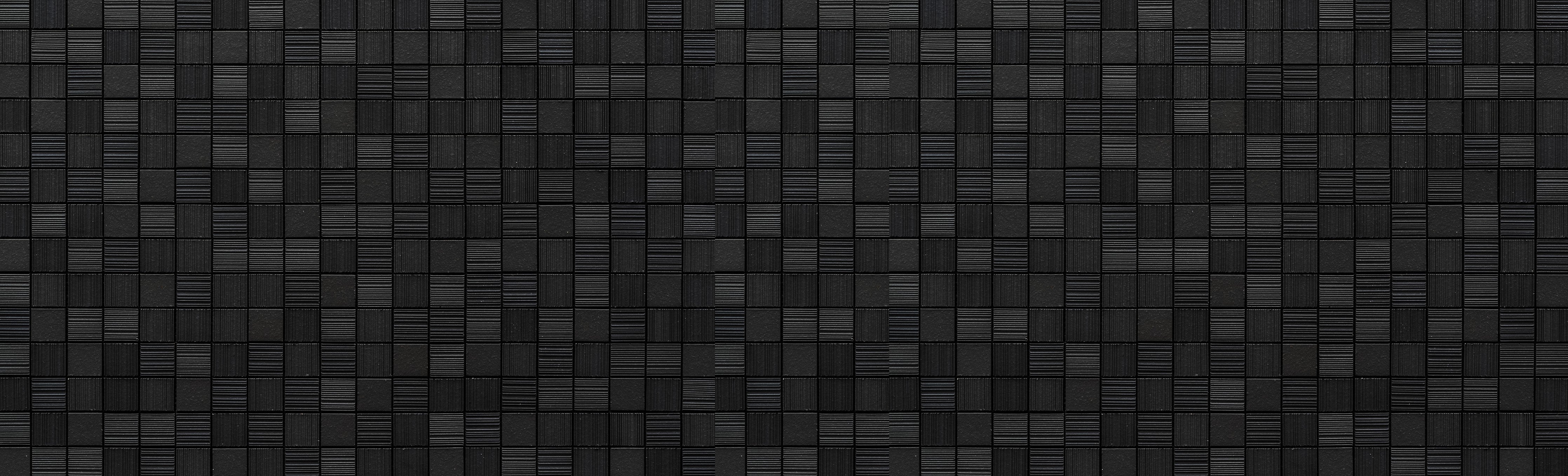 Wandverkleidung Schlafzimmer-Schwarze Mosaikfliesen für modernes Design