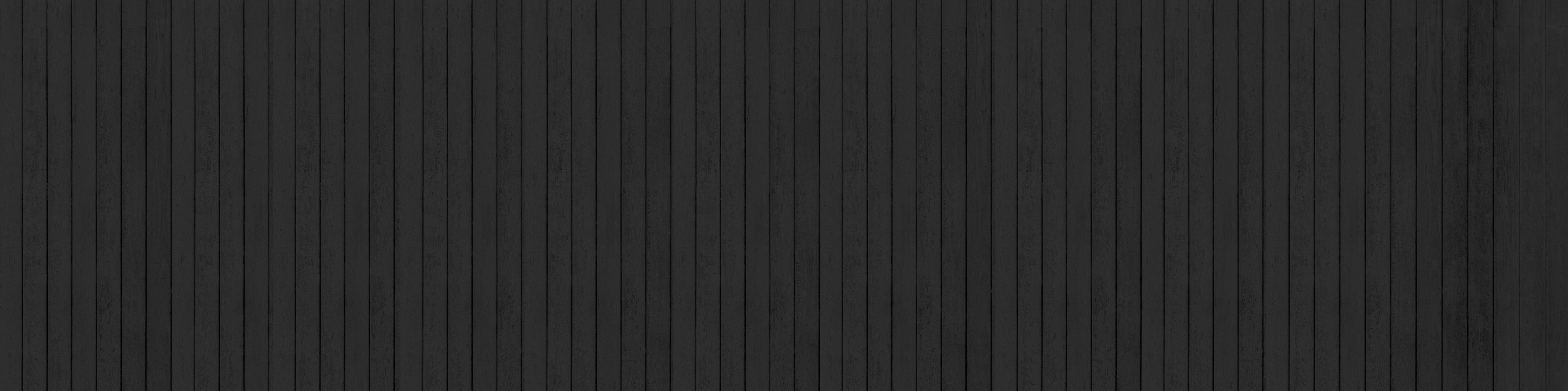 Wandverkleidung Schlafzimmer-Schwarze Wand mit feinen Vertikallinien
