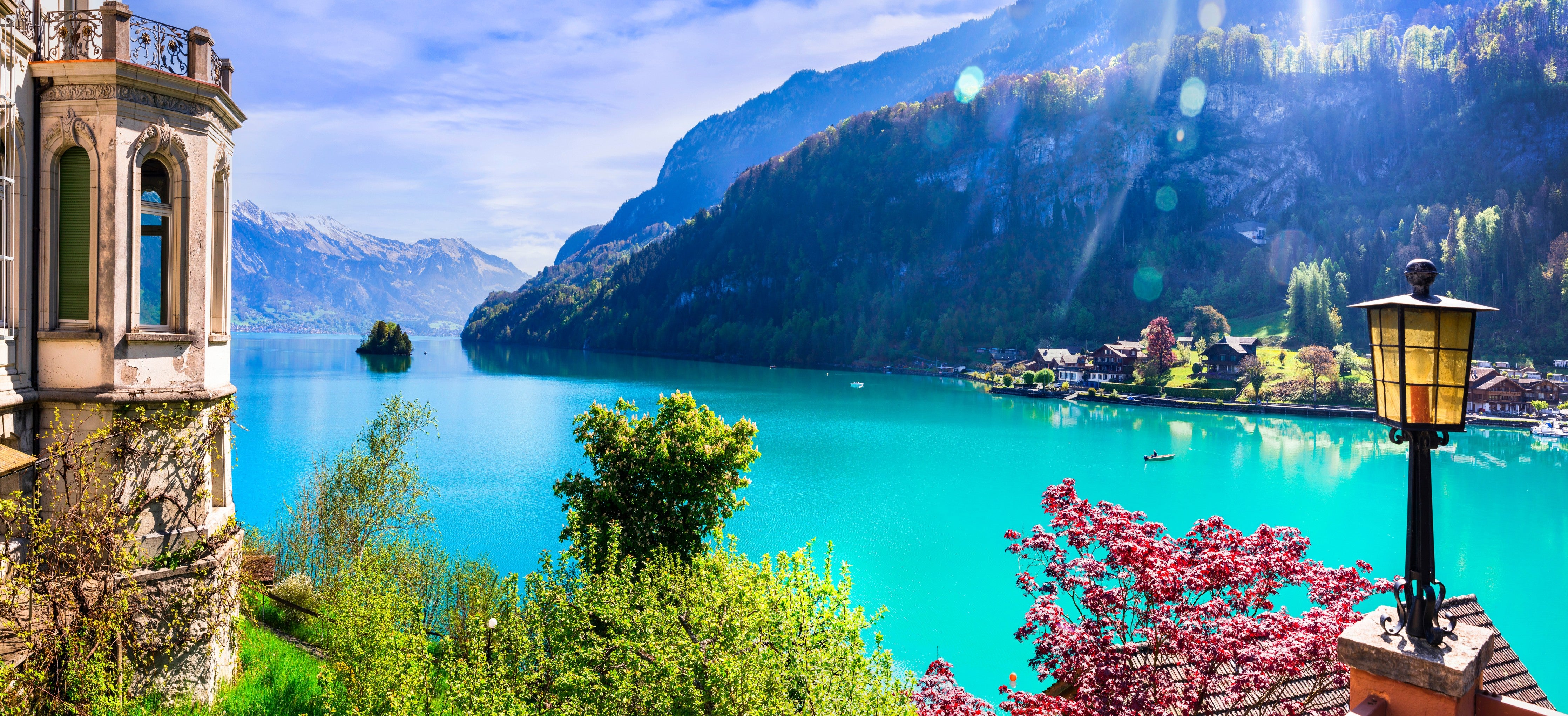 Wandverkleidung Schlafzimmer-Türkiser Bergsee mit Alpenpanorama