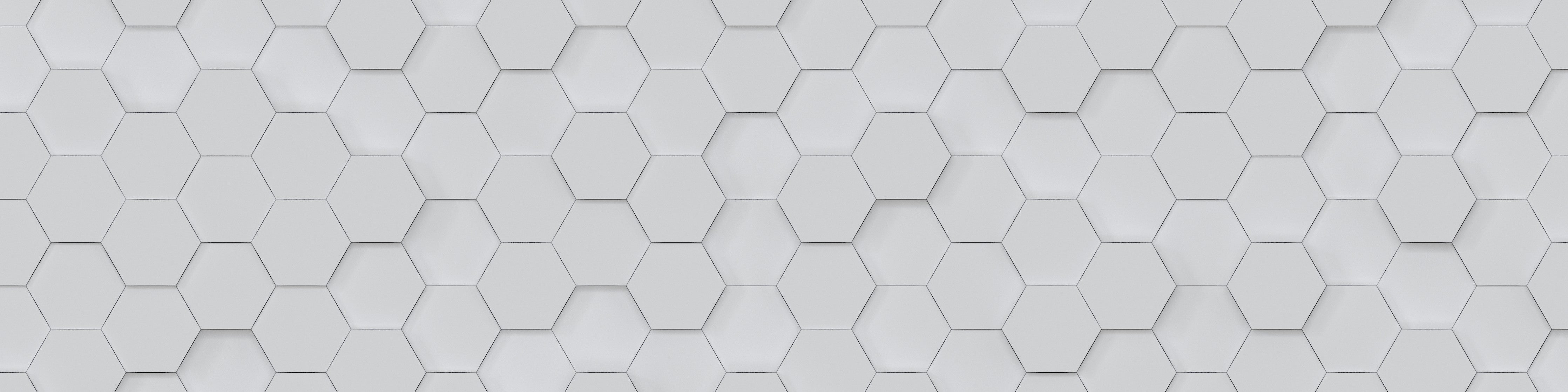 Wandverkleidung Schlafzimmer-Weiße Hexagon-Fliesen mit dezenter Musterung
