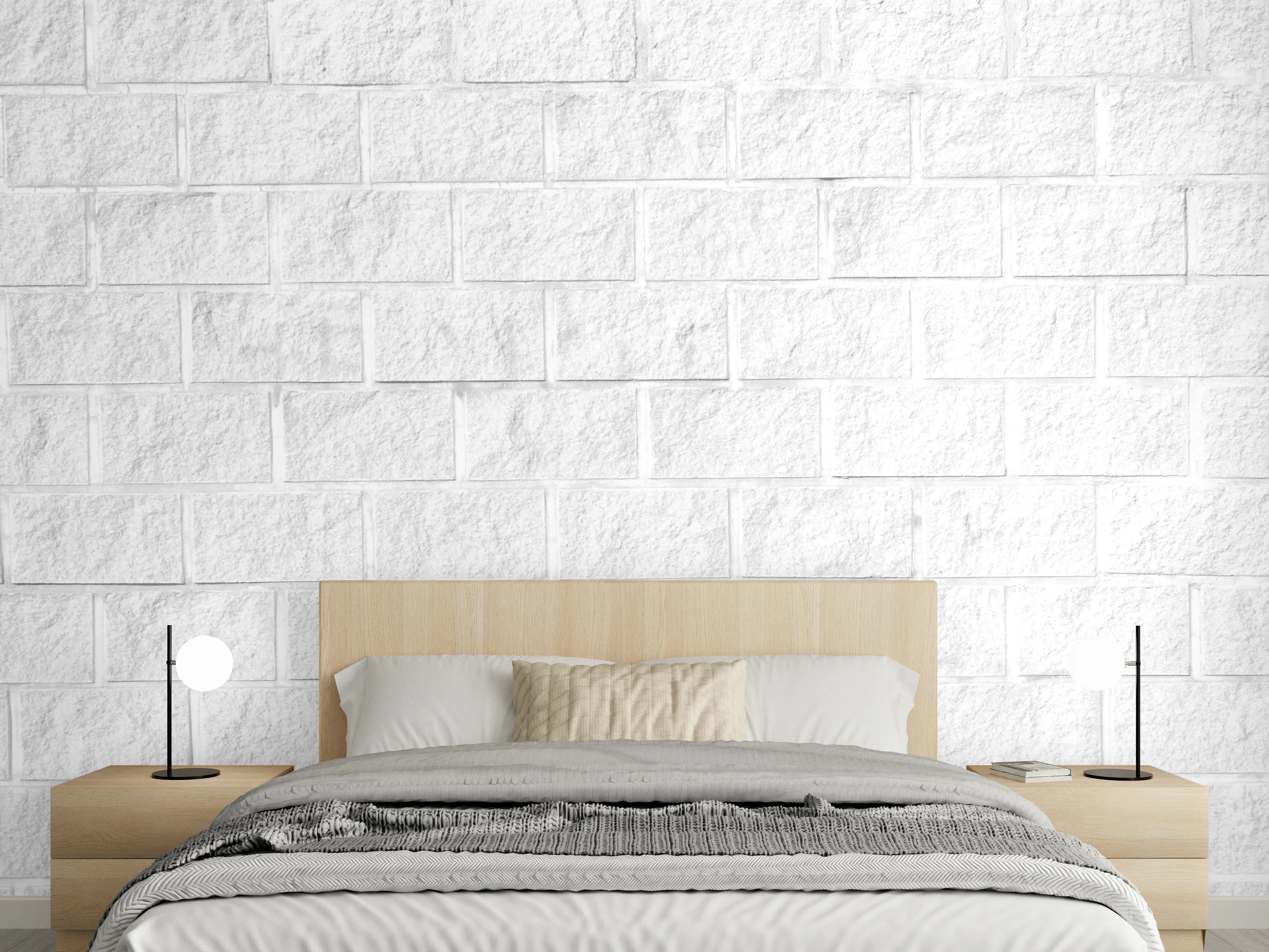 Wandverkleidung Schlafzimmer - Weiße Steinwand mit dezenter Struktur