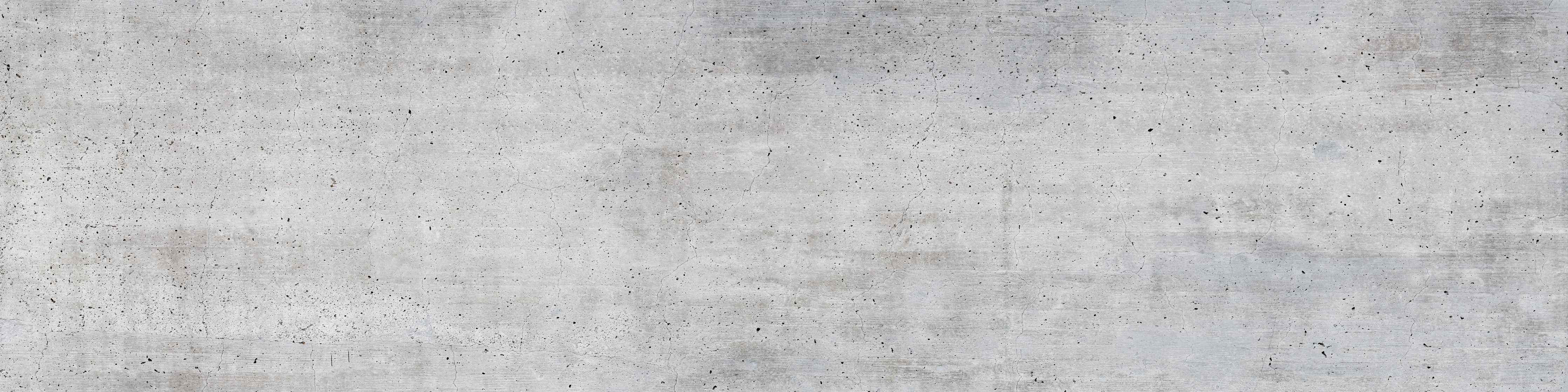 Wandverkleidung Wohnzimmer-Alte gräuliche Betonmauer