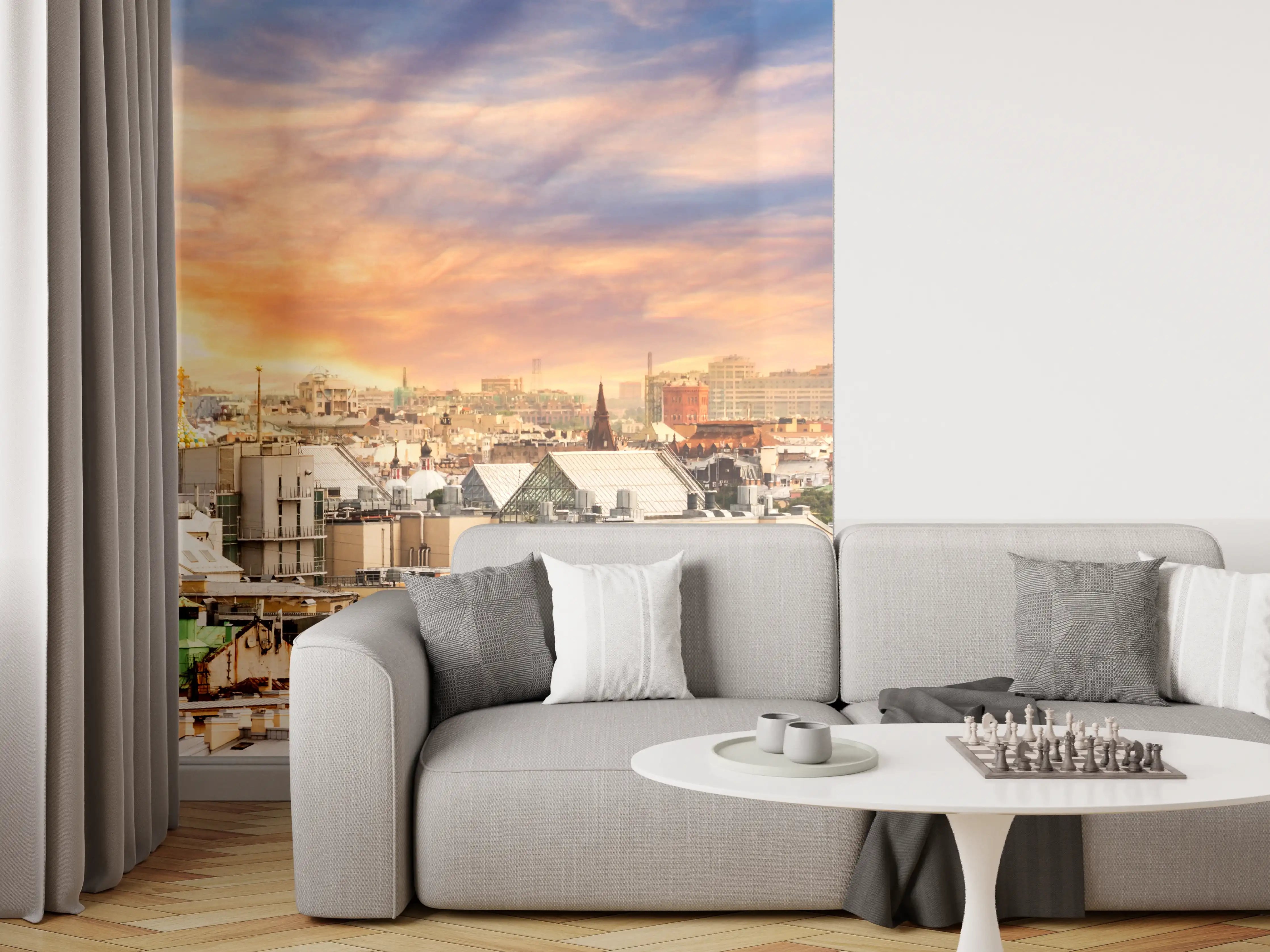 Wandverkleidung Wohnzimmer - Blick über die Stadt bei Sonnenuntergang