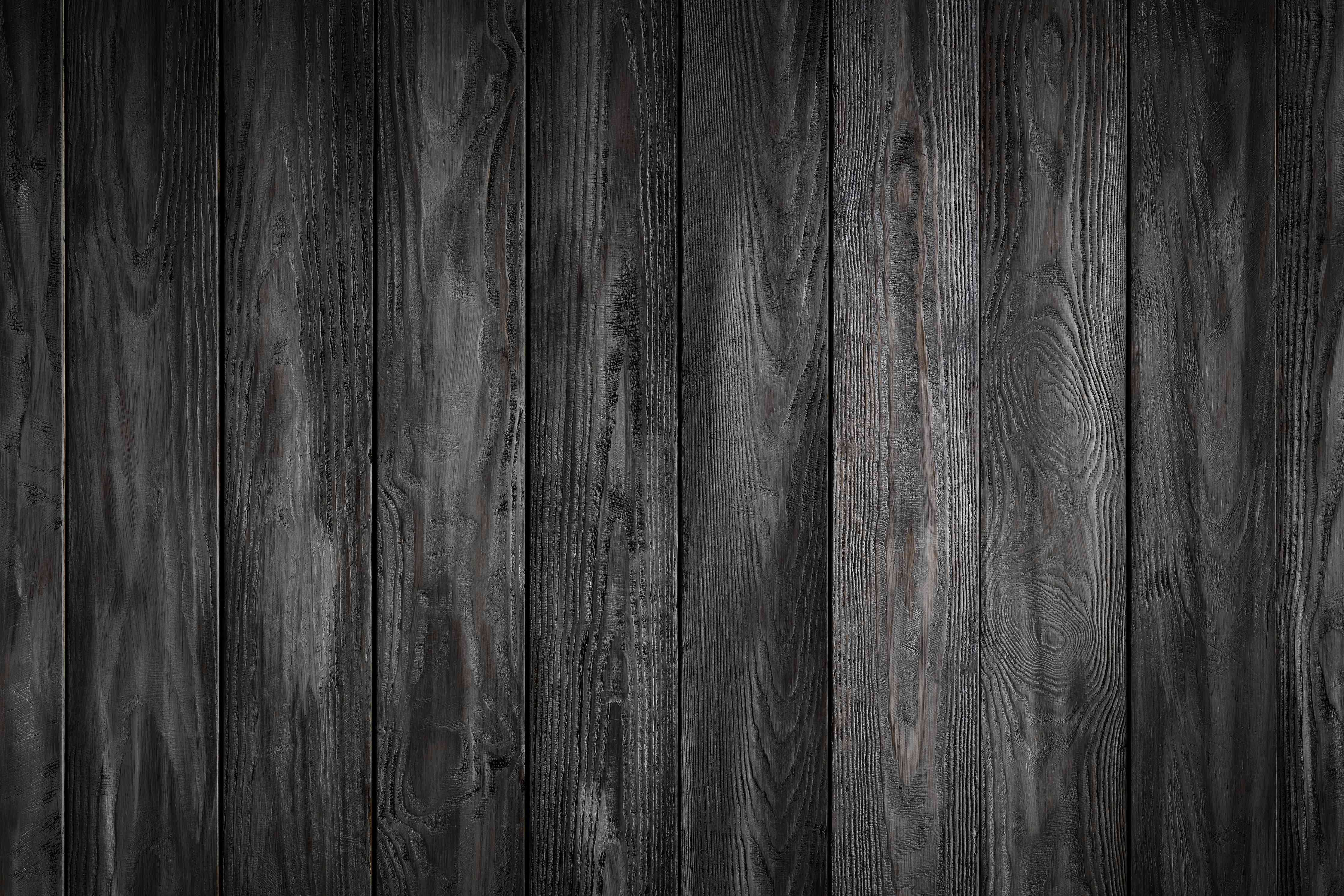 Wandverkleidung Wohnzimmer-Dunkle Holzlamellen Wandgestaltung