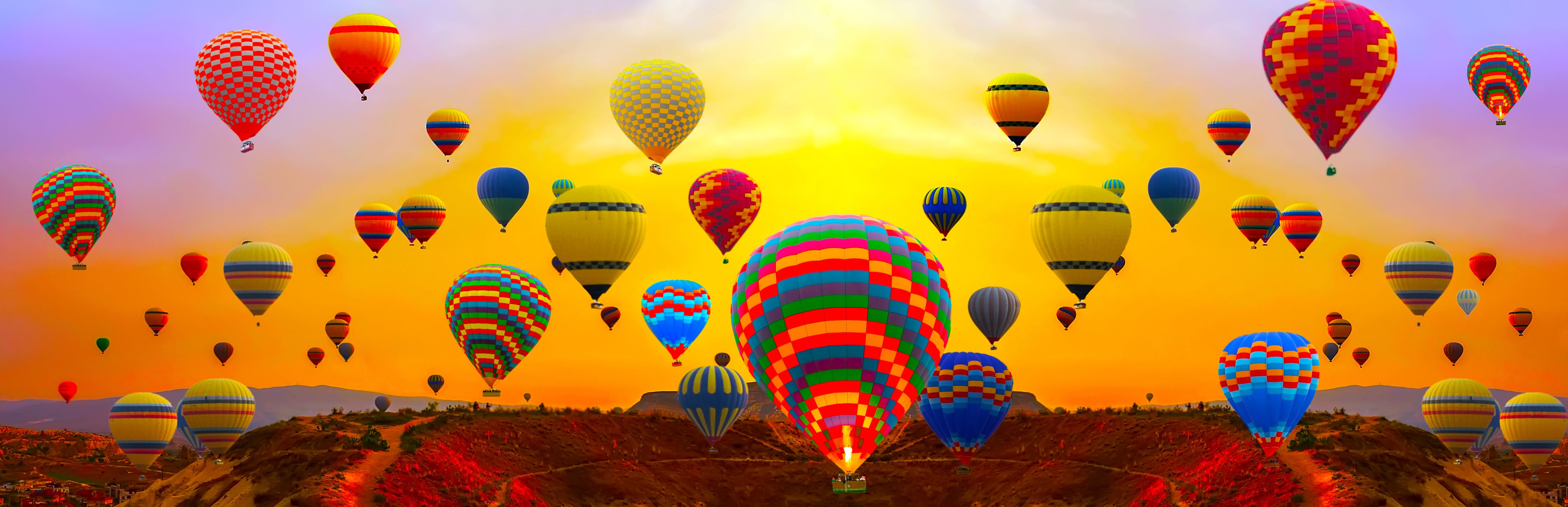 Wandverkleidung Wohnzimmer-Farbprächtiges Heißluftballon-Festival bei Sonnenuntergang