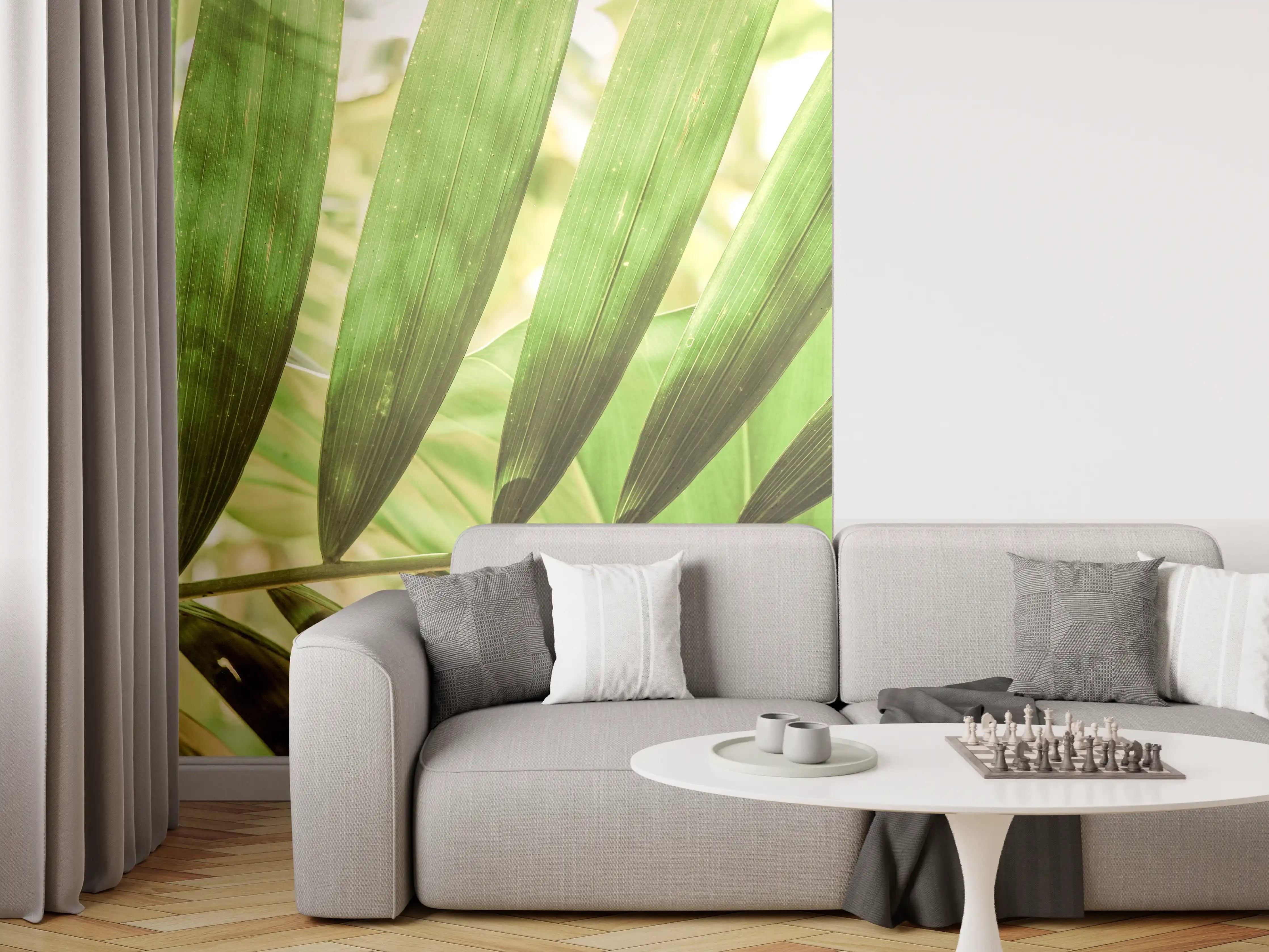 Wandverkleidung Wohnzimmer - Frische grüne Palmblätter im Sonnenlicht