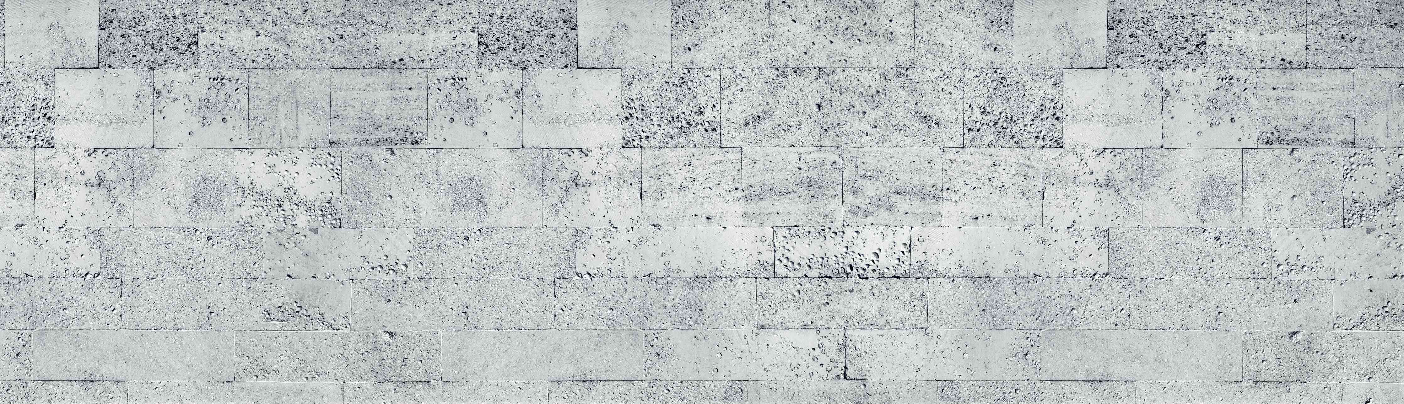 Wandverkleidung Wohnzimmer-Gräuliche Tuffstein-Blockwand