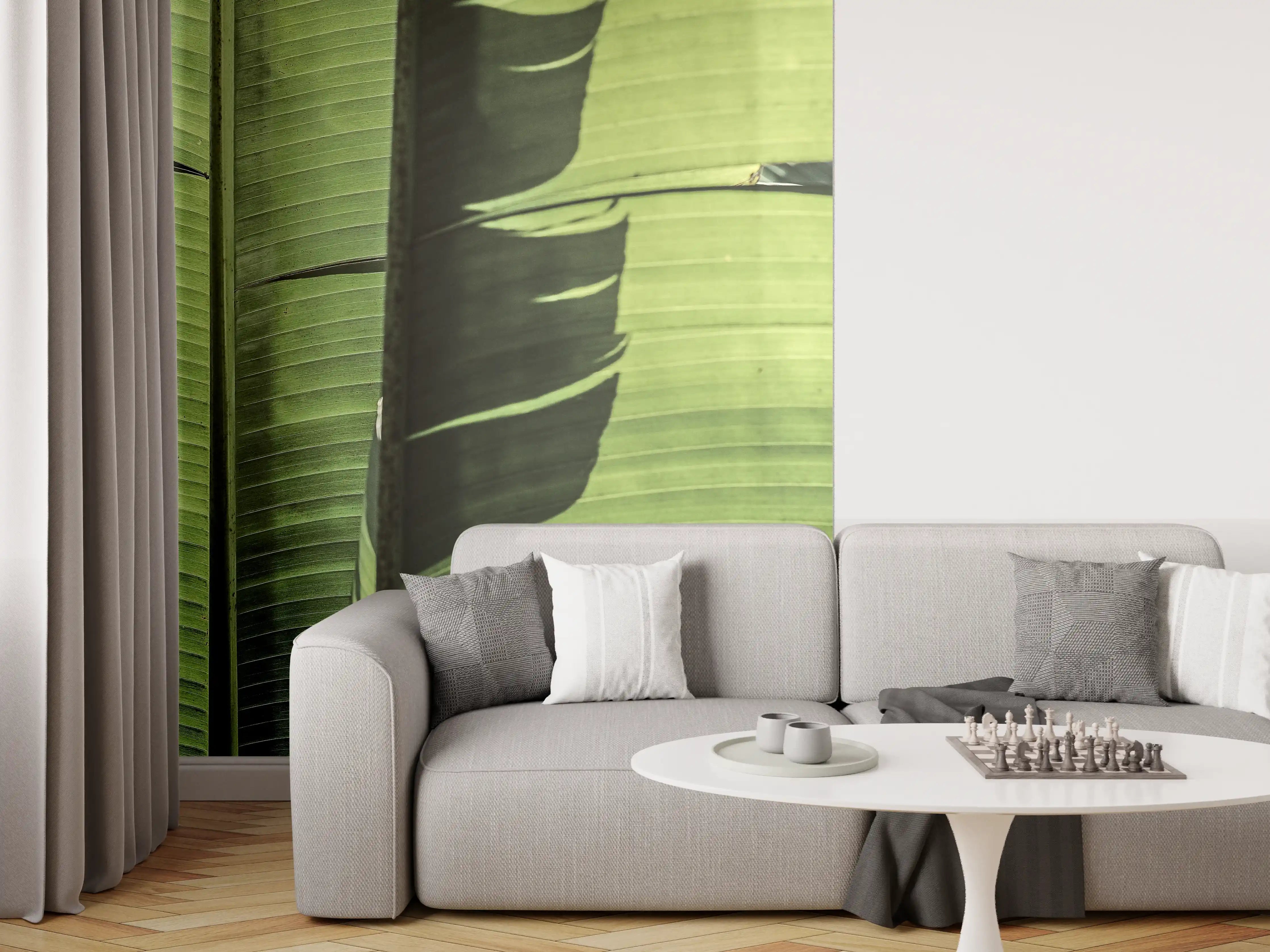 Wandverkleidung Wohnzimmer - Grüne Bananenblätter im sonnigen Licht
