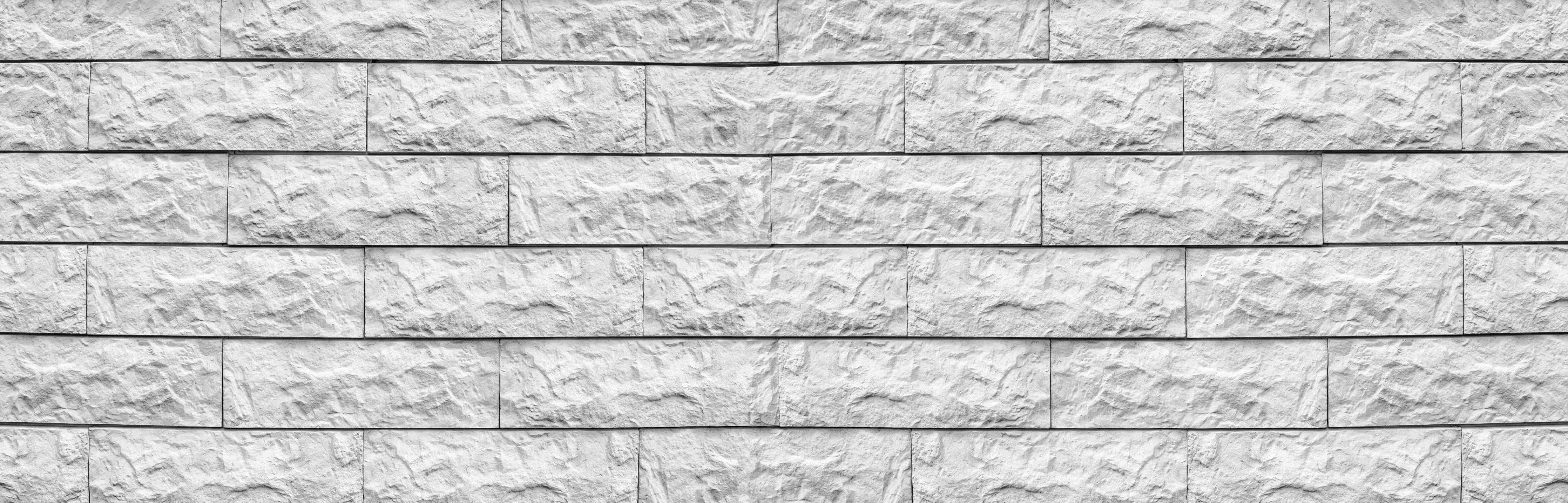 Wandverkleidung Wohnzimmer-Helle Steinwand Fliesen