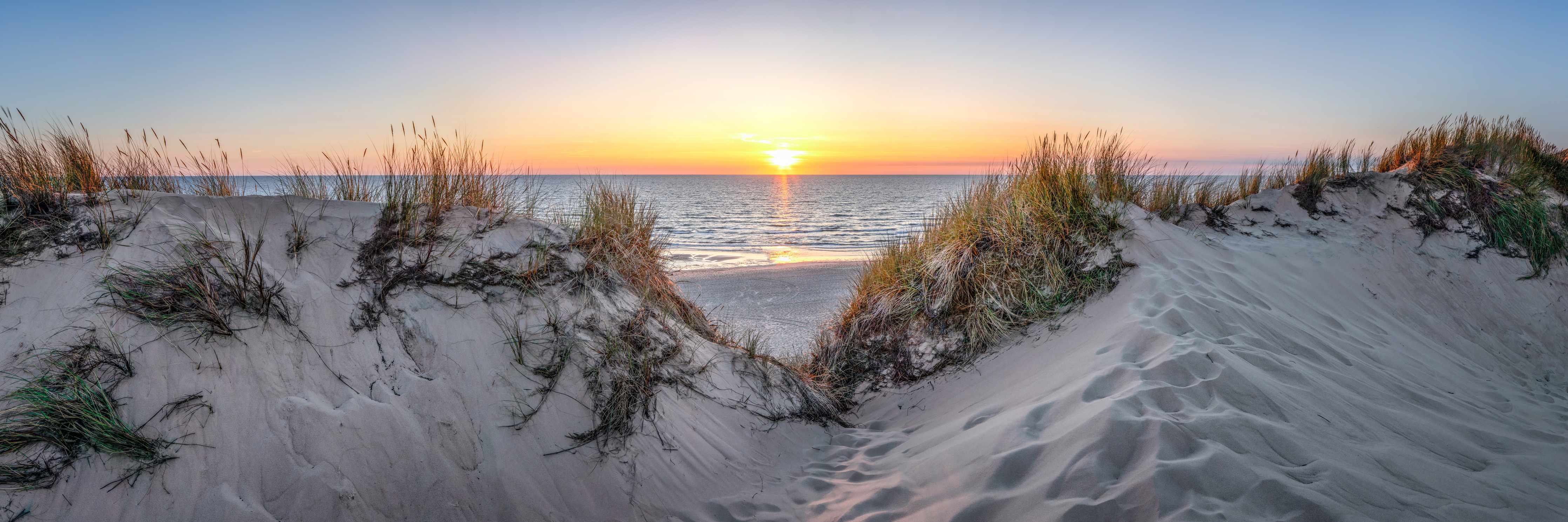 Wandverkleidung Wohnzimmer-Idyllischer Sonnenuntergang am Strand