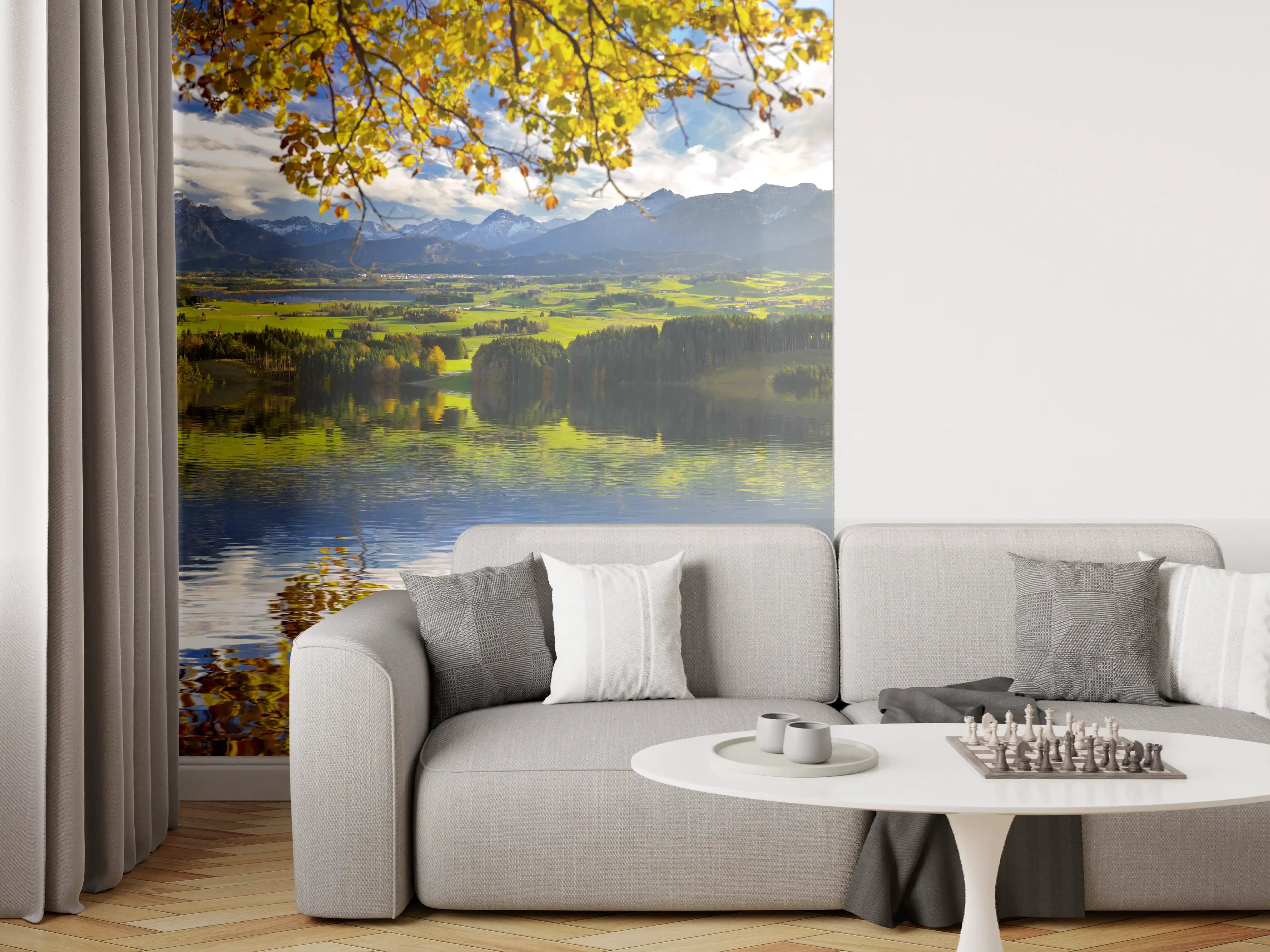 Wandverkleidung Wohnzimmer - Idyllisches Landschaftsbild mit Wasser und Bergen