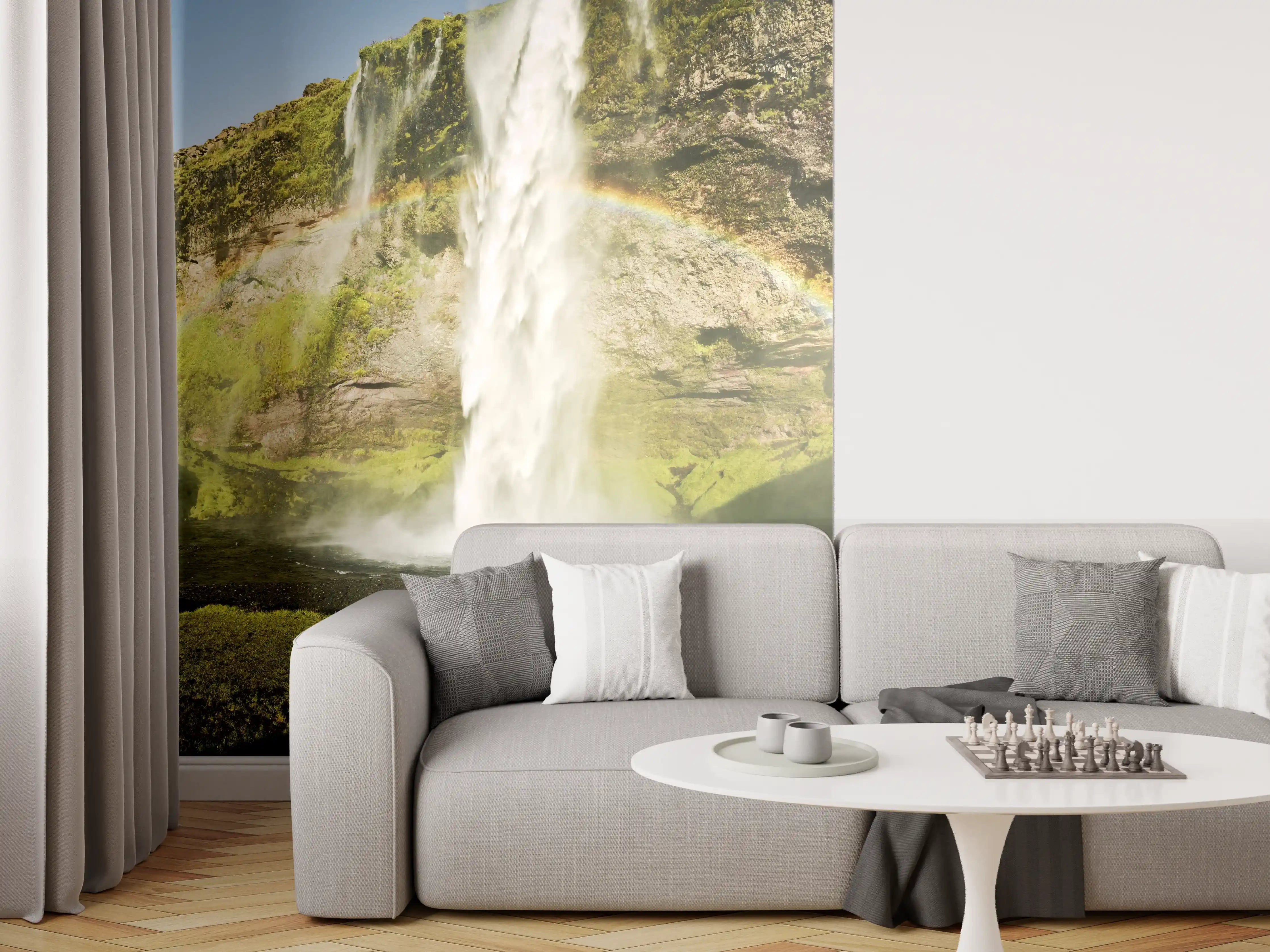 Wandverkleidung Wohnzimmer - Majestätischer Wasserfall mit Regenbogen in Island