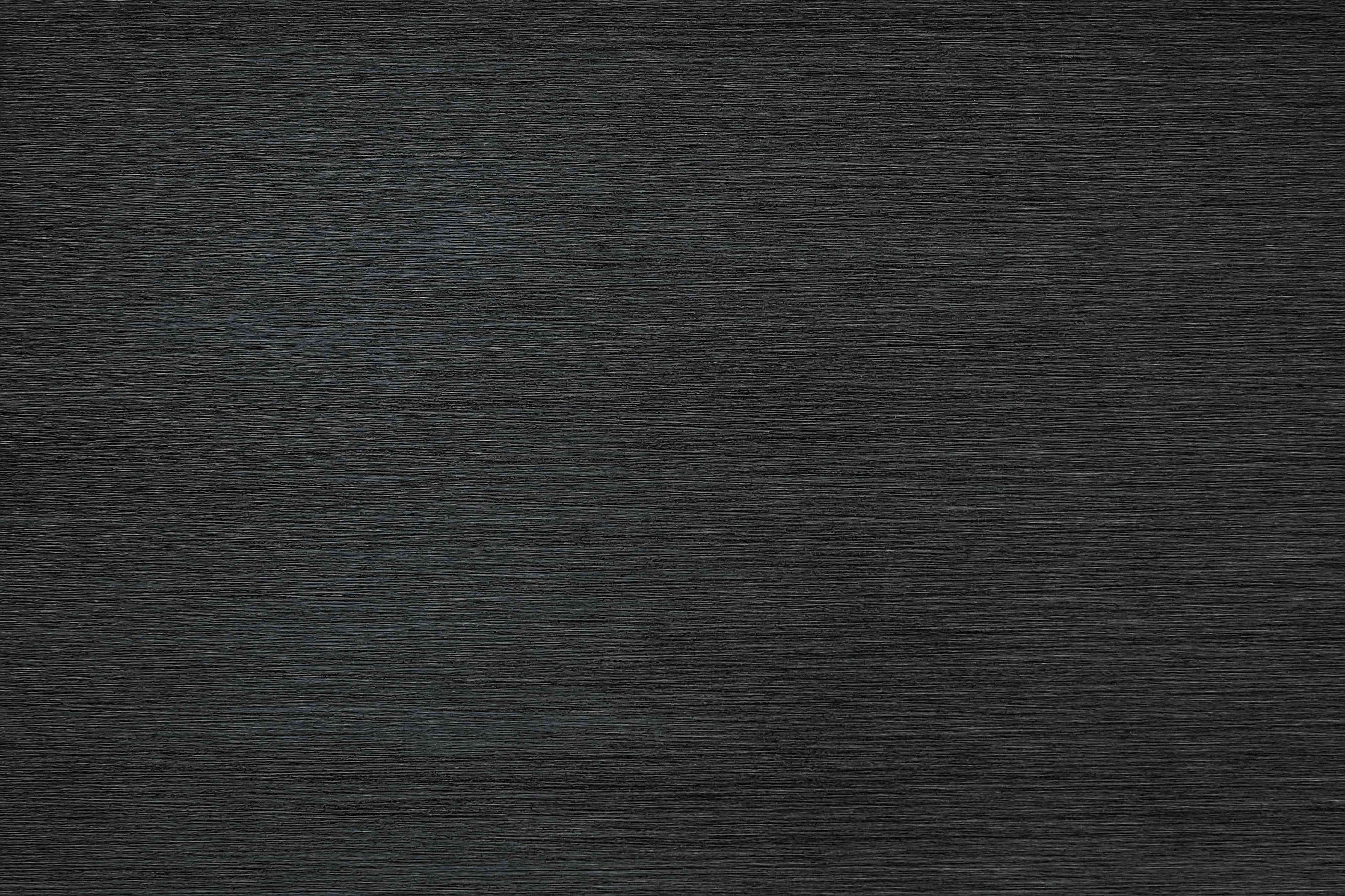 Wandverkleidung Wohnzimmer-Schwarze Metall-Oberfläche