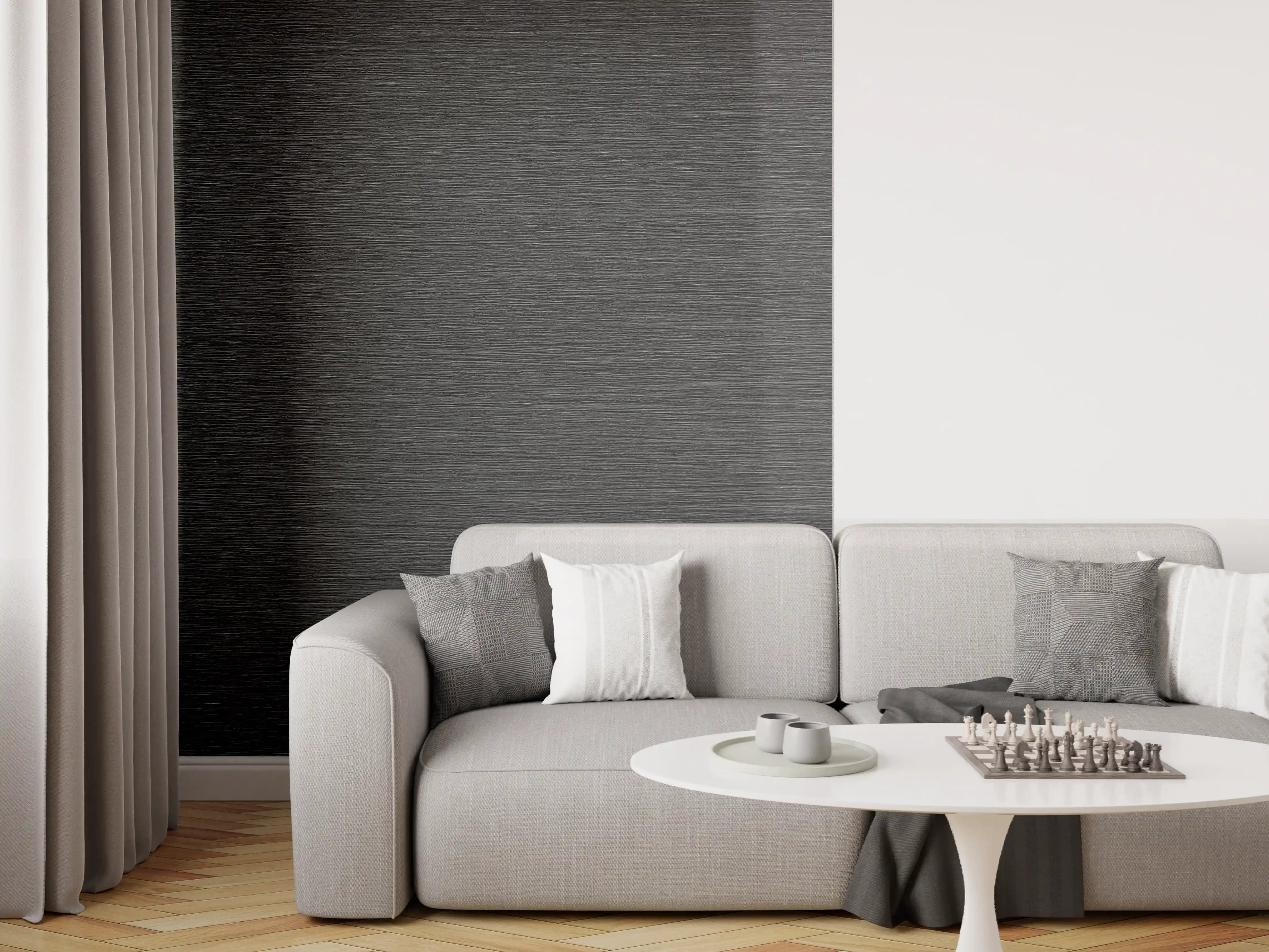 Wandverkleidung Wohnzimmer - Schwarze Metall-Oberfläche