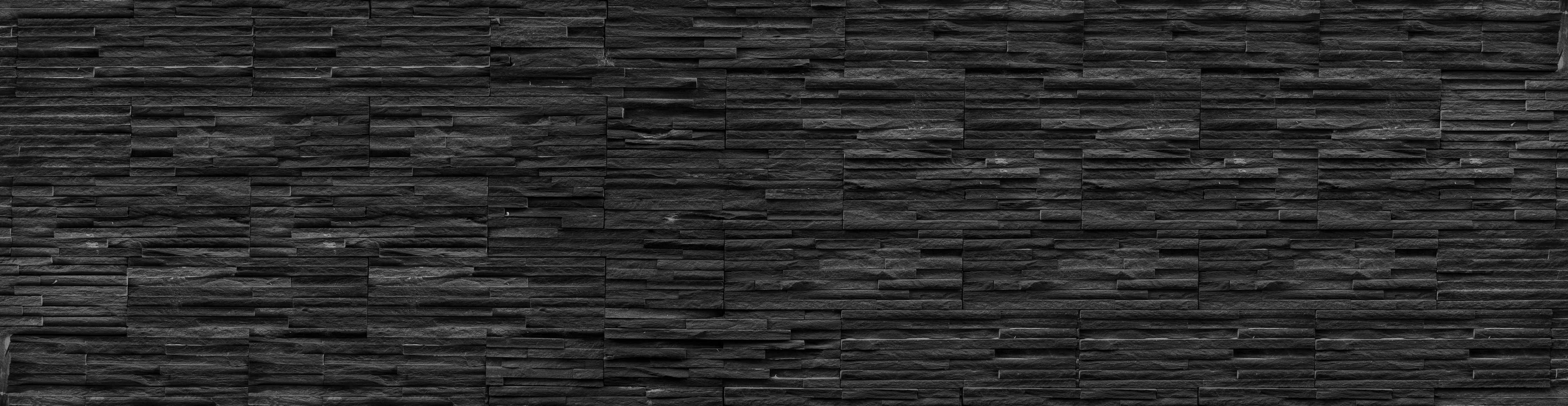 Wandverkleidung Wohnzimmer-Schwarze Schieferstein-Mauer
