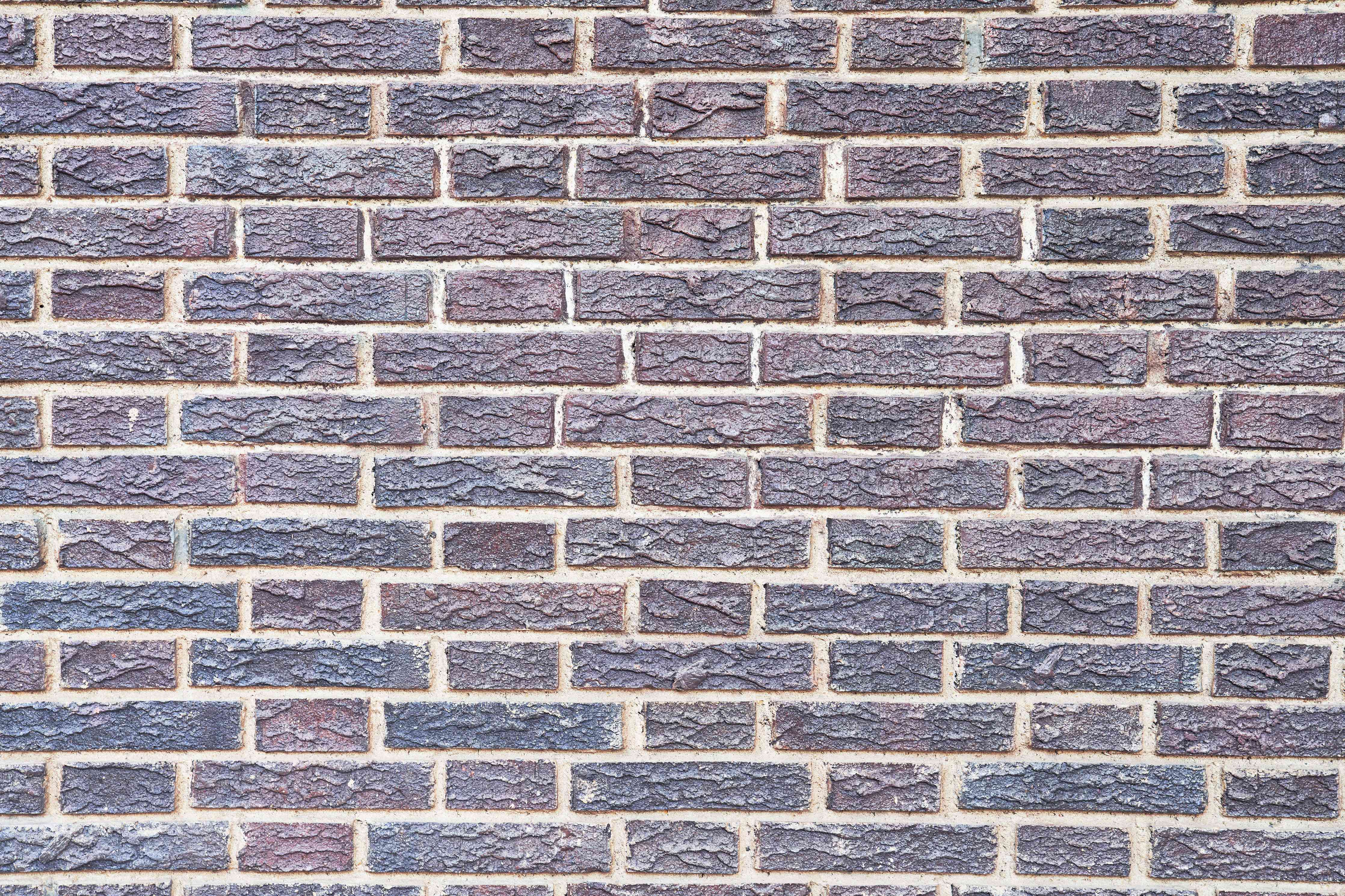 Wandverkleidung Wohnzimmer-Zementmauertextur mit rissigen Fliesen