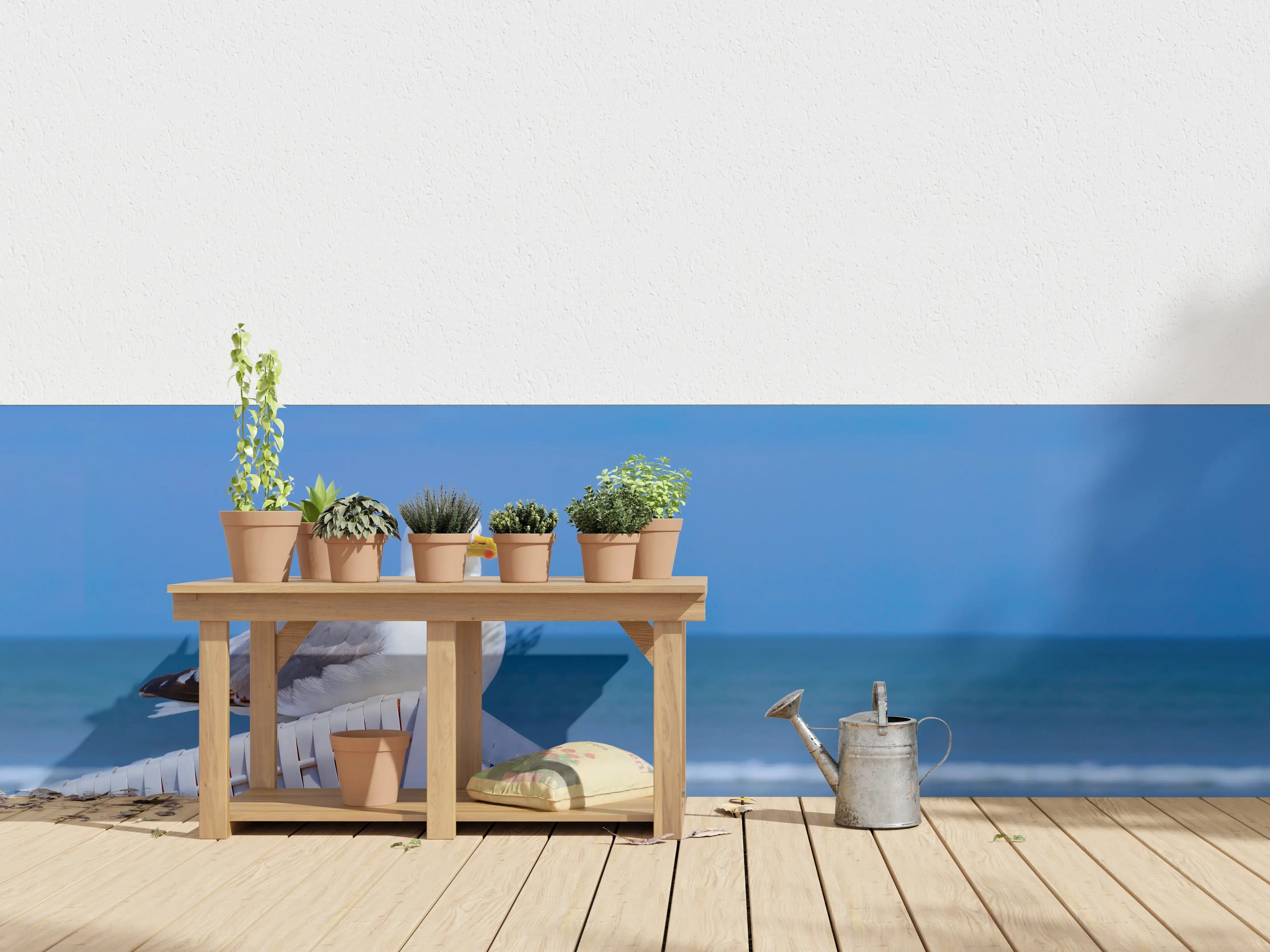 Wandverkleidung außen - Seegull am Strand mit blauem Hintergrund