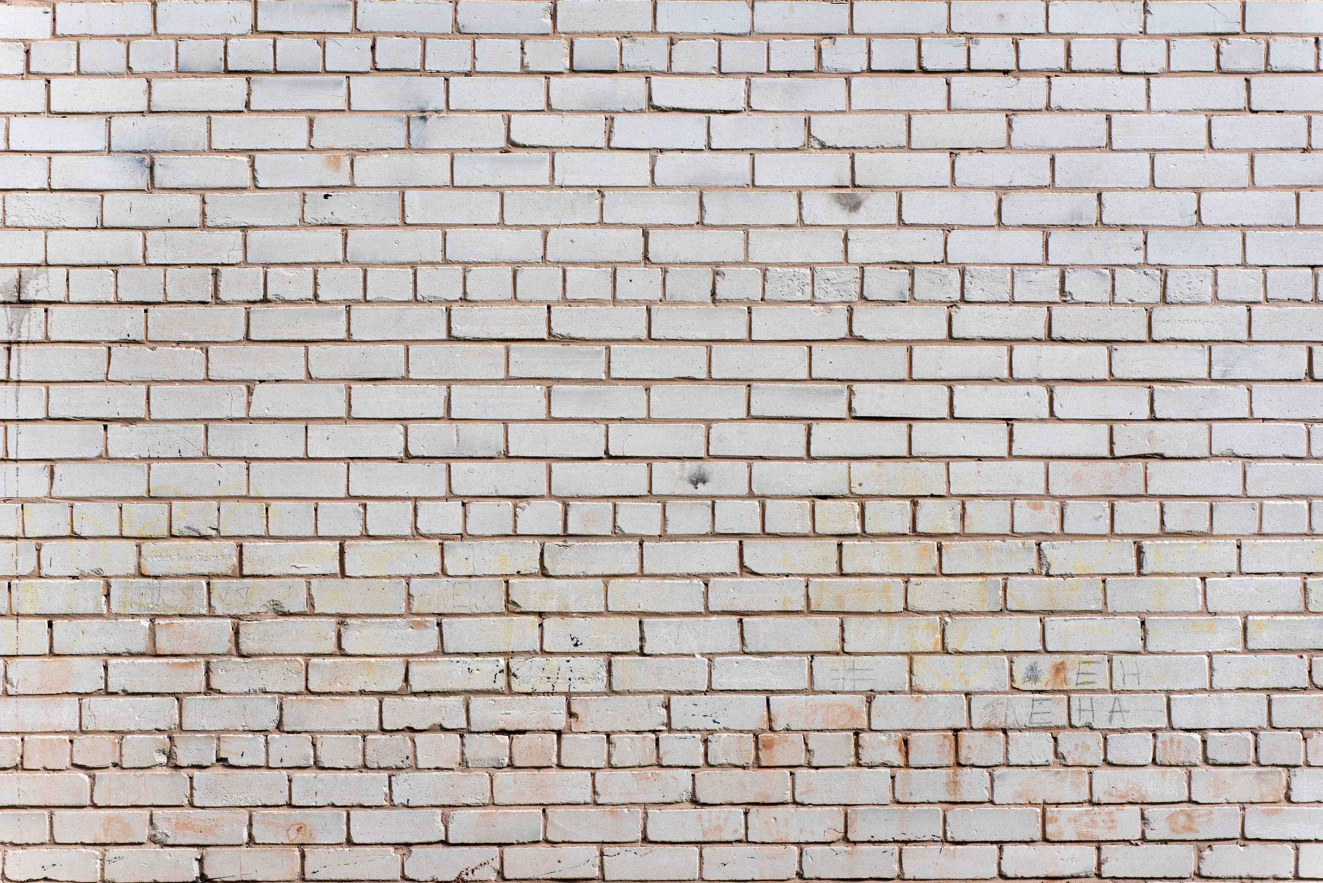 Wandverkleidung außen-Weiße Ziegelwand mit zarten Grautönen - realistische Textur