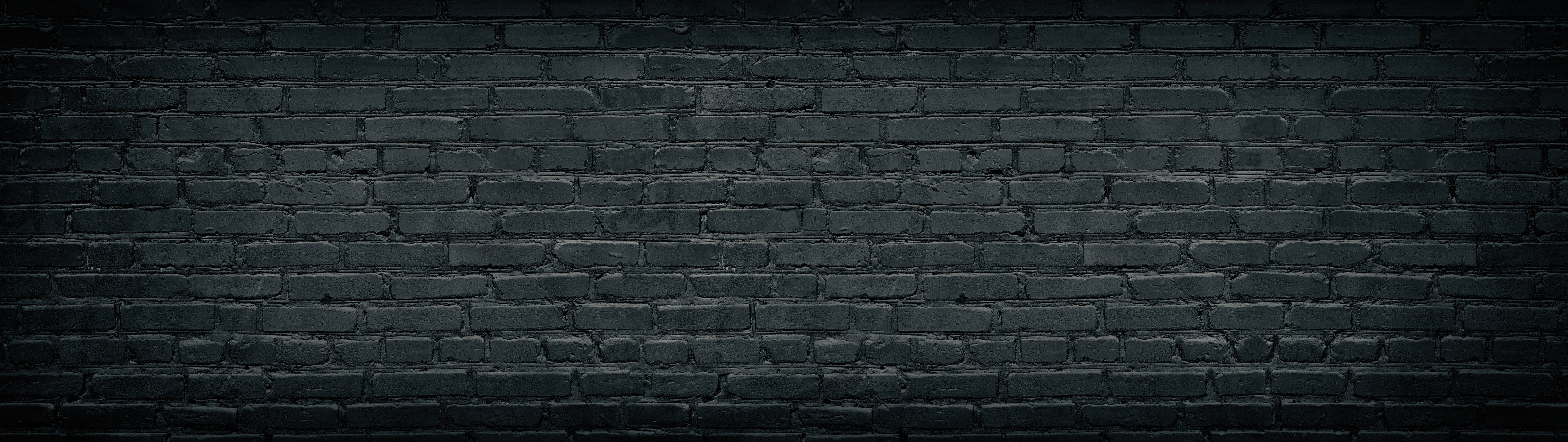Waschbecken-Rückwand-Grauschwarze Ziegelwand im Loftstil