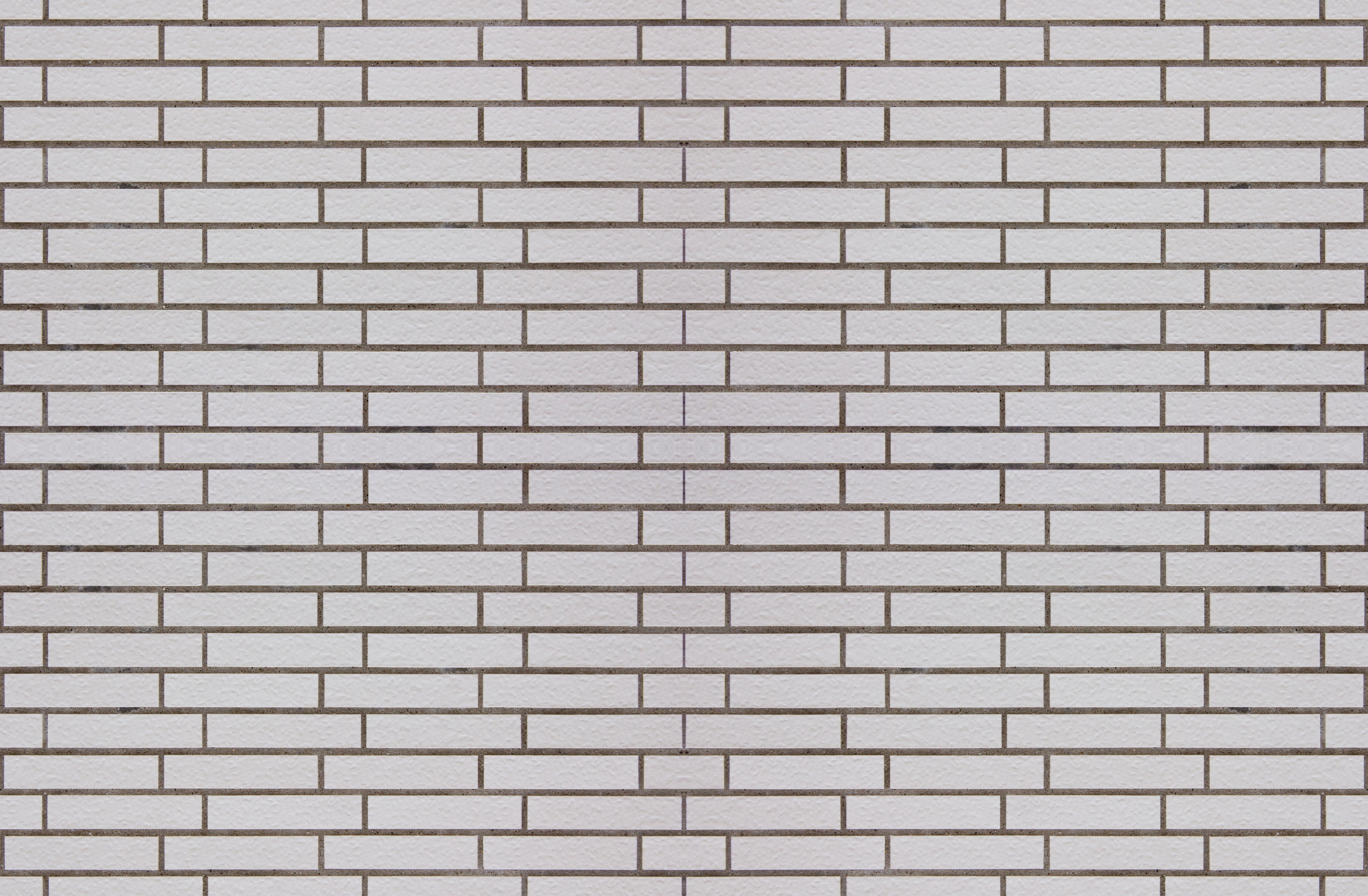 Waschbecken-Rückwand-Weiße Ziegelwand mit grauem Mörtel